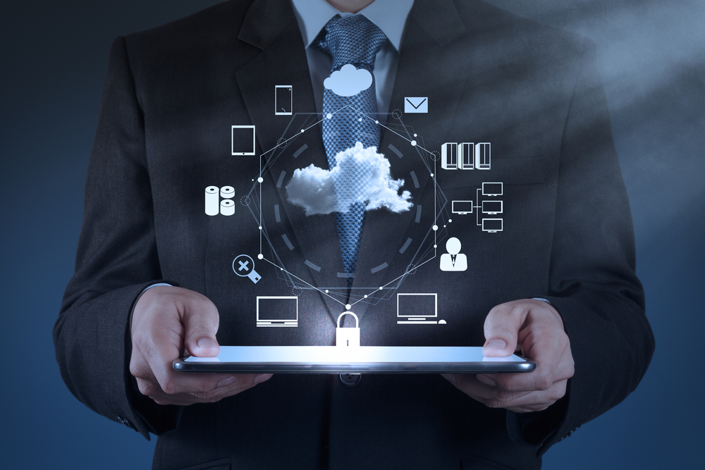 Businessman hand working with a Cloud Computing diagram on the new computer interface as concept-1